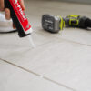 Fix a Floor Repair Adhesive In Use on Floor